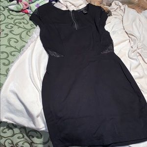 Black bodycon mini dress with fishnet cutouts